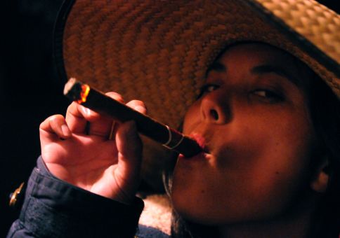 Laura flossing her cigar
