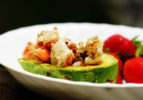 Shrimp-stuffed avocado  & strawberries 